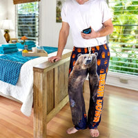 Thumbnail for Image of male model posing at the edge of bed wearing Bear Down pajama lounge pants (front view)