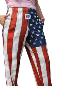 Thumbnail for American Flag Pajama Lounge Pants side angle/front view on model