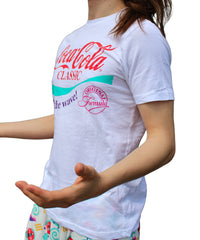 Thumbnail for Coca Cola 90's shirt on model side angle/front view with arms in an open gesture