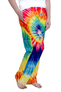 Thumbnail for Waist down photo of model wearing Rainbow Tie-Dye pajama lounge pants front/side view #1 (white background)