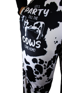 Thumbnail for Party 'Till The Cows Come Home pajama lounge pants on model showing one leg (close up front view with hand in pocket)