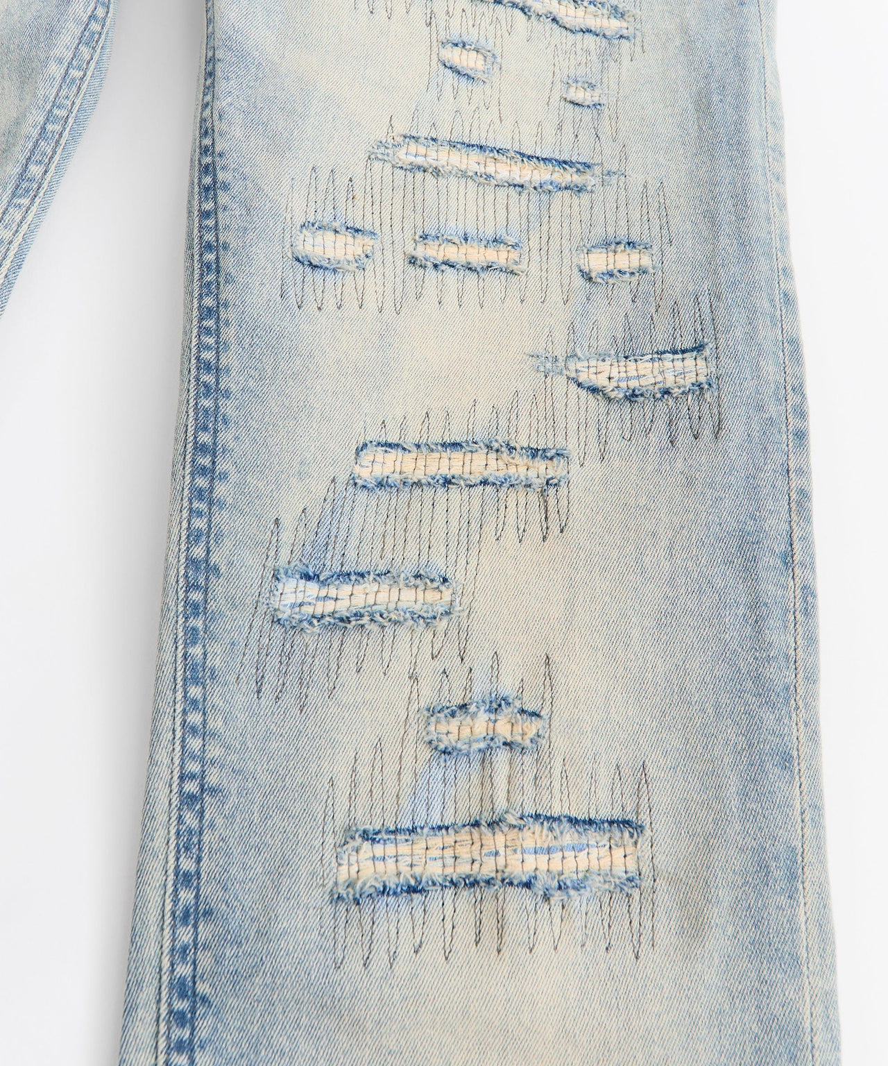 Light Wash Repaired Denim Jeans