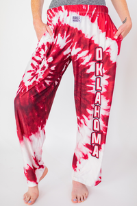 Thumbnail for Waist down photo of model wearing Oklahoma Red Tie-Dye pajama lounge pants front view (white background)
