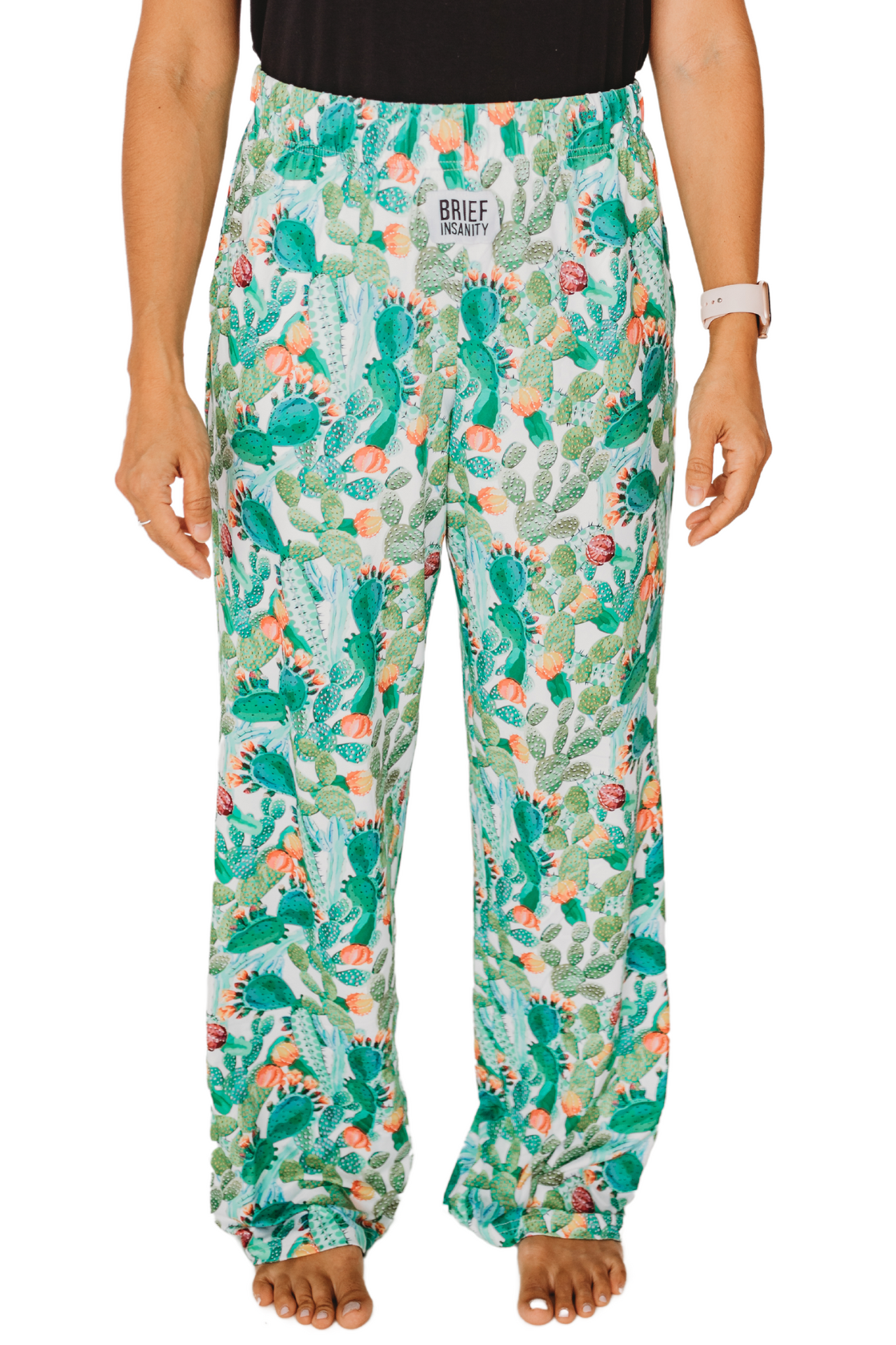 Waist down photo of model wearing Cactus Floral pajama lounge pants front view (white background)