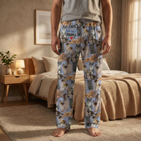 Thumbnail for Male model wearing Cats Favorite People Lounge Pants standing in a warm lit bedroom with a neatly made bed and minimal decor, emphasizing comfort and relaxed style.