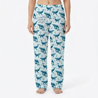 Thumbnail for Model wearing Everything Whale Be Alright lounge pants with whale and seaweed print on a white background, centered and fully visible.