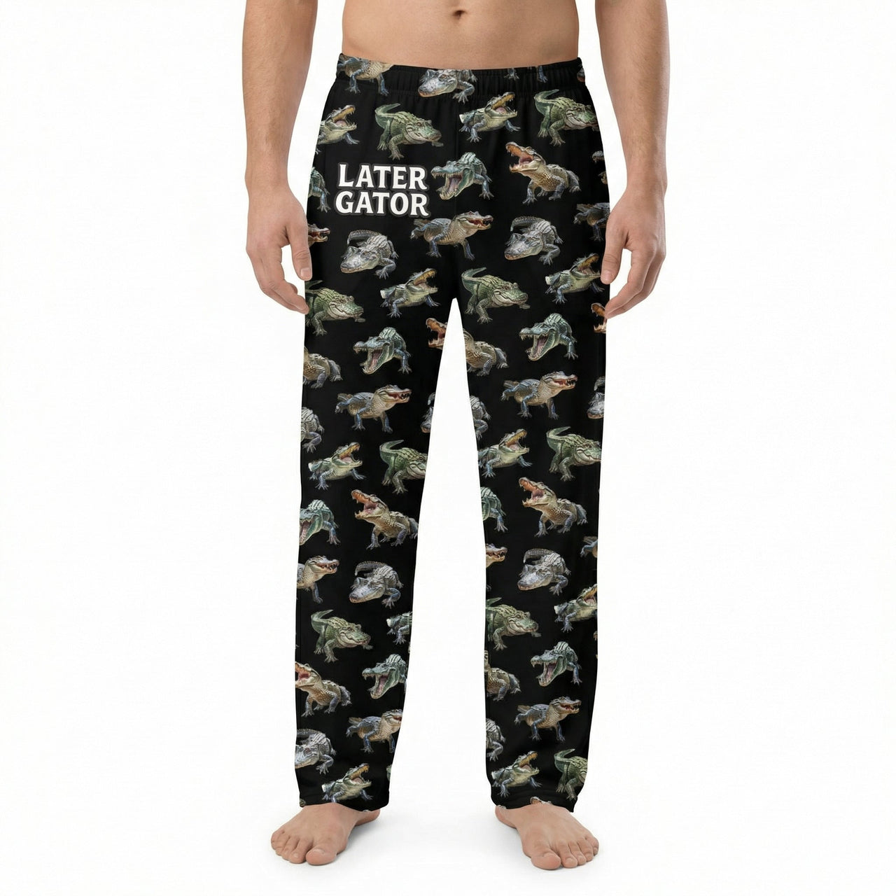 Black alligator print lounge pants on a model against white background, showing the full design and fabric details.
