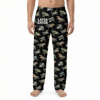 Thumbnail for Black alligator print lounge pants on a model against white background, showing the full design and fabric details.