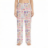 Thumbnail for Model wearing Nurse Doodles lounge pants with medical icons on a white background, showcasing vibrant colors and relaxed fit.