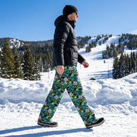 Thumbnail for Model walking outside on snow wearing snowboard lounge pants with vibrant accents, emphasizing fabric movement and practical fit in a snowy landscape.