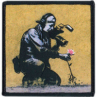 Thumbnail for Banksy's Graffiti Flower Puller 3.4