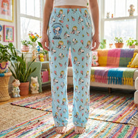 Thumbnail for Young female model wearing Snoopy ice cream lounge pants cropped from waist to ankles on white background.
