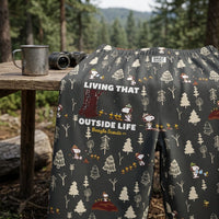 Thumbnail for Close-up of Snoopy Outside Life lounge pants showing detailed woodland print and fabric texture under natural light.