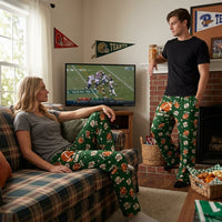 Thumbnail for Close-up of Team Spirit Snoopy Football Lounge Pants showcasing football-themed print and 'Game Day' text with textured fabric details.